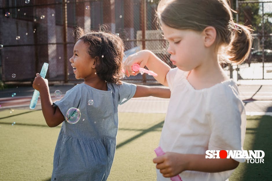 children playing with bubbles